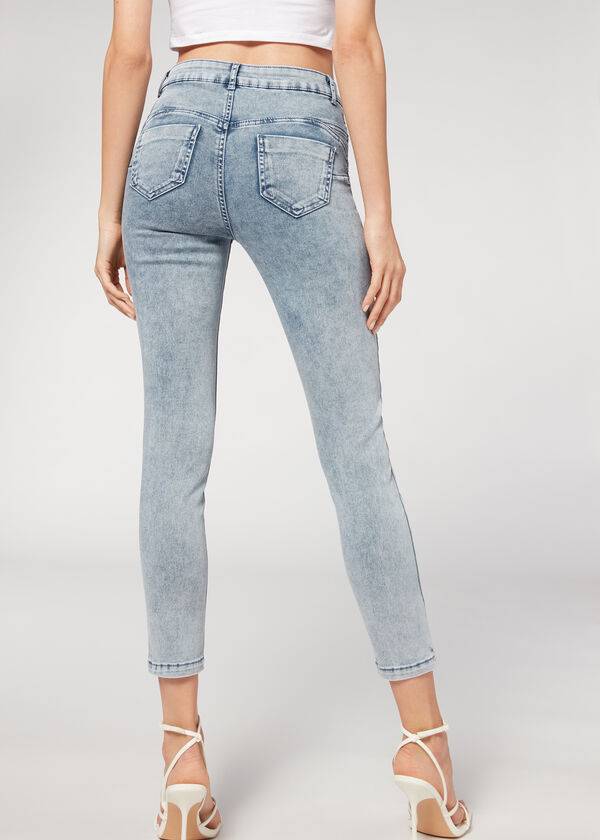 vaqueros ajustados push-up descoloridos calzedonia para mujer en azul