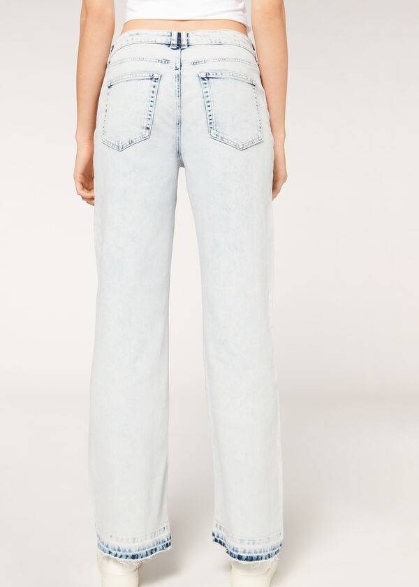 vaqueros deshilachados de pierna ancha calzedonia para mujer en color azul