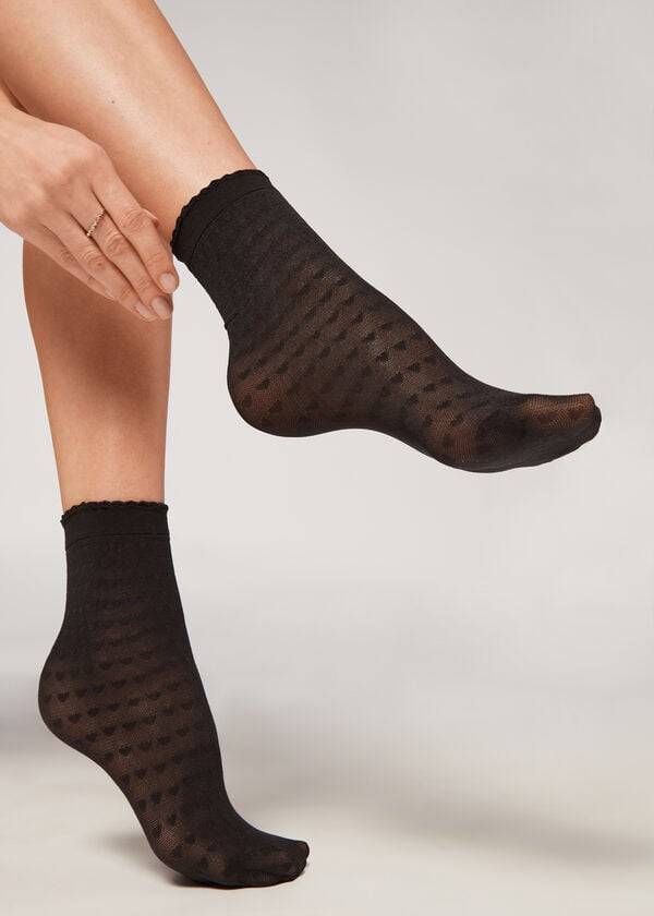 calcetines cortos de malla negros con motivo de corazón de calzedonia para mujer