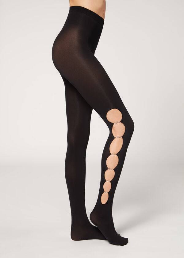 medias negras calzedonia para mujer con recortes de diamantes de imitación 100 deniers opacas y con estampado ecológico