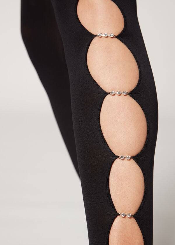 medias negras calzedonia para mujer con recortes de diamantes de imitación 100 deniers opacas y con estampado ecológico