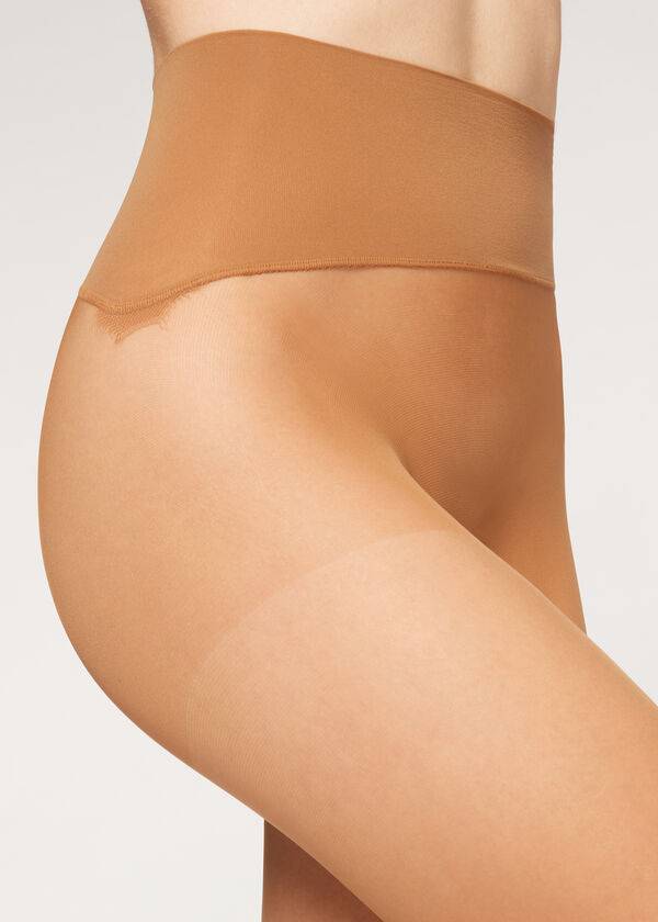 medias invisibles transparentes esenciales de calzedonia de 20 deniers para mujer color beige y marrón