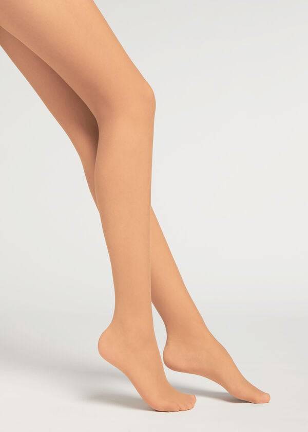 medias invisibles transparentes esenciales de calzedonia de 20 deniers para mujer color beige y marrón