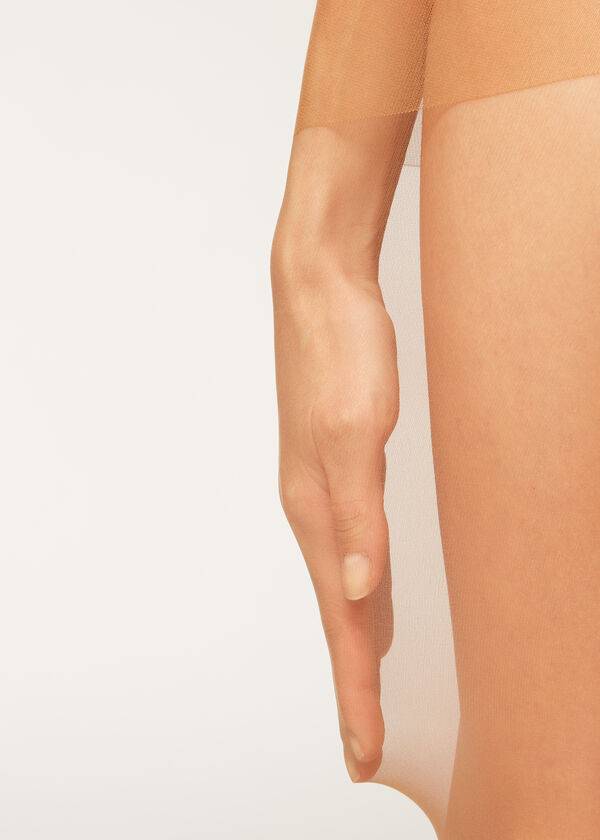medias transparentes mate esenciales calzedonia de 20 deniers para mujer color beigemarrón
