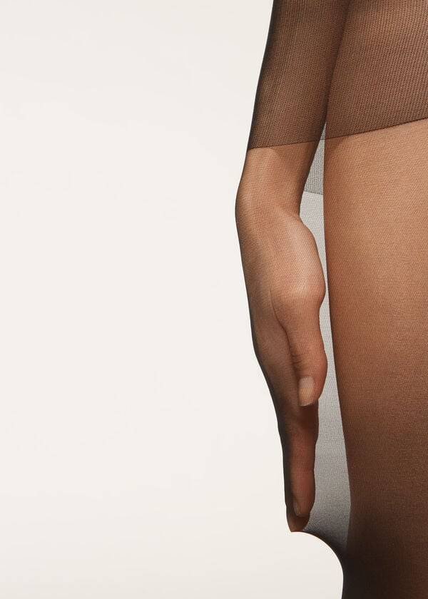 medias transparentes de media altura action de 40 deniers de calzedonia para mujer color negro
