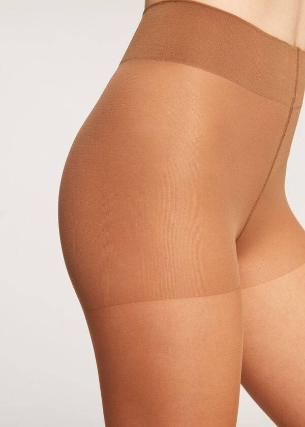 medias transparentes medianas action de 40 deniers de calzedonia para mujer color marrón