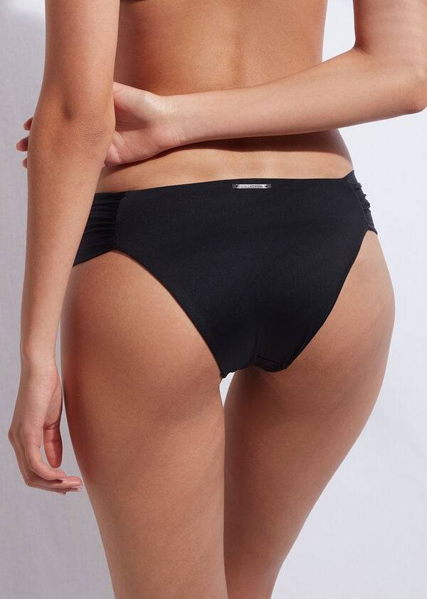 braguita de bikini indonesia con volantes calzedonia para mujer color negro