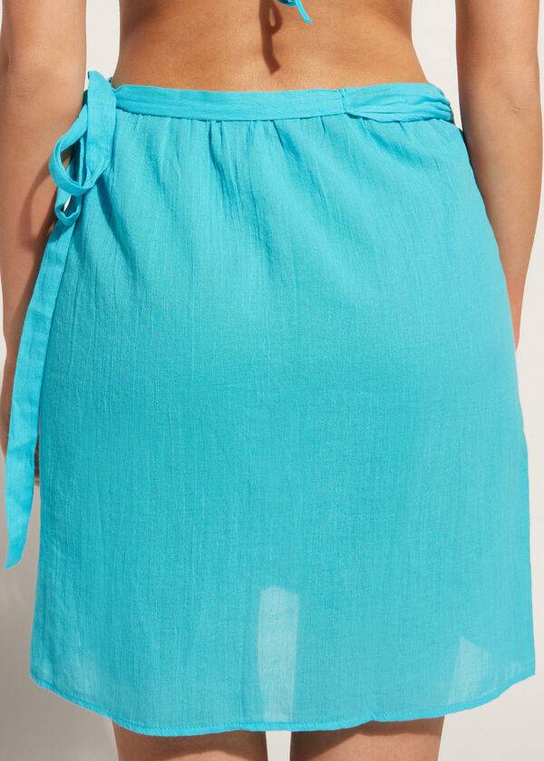 pareo corto calzedonia para mujer color turquesa y verde